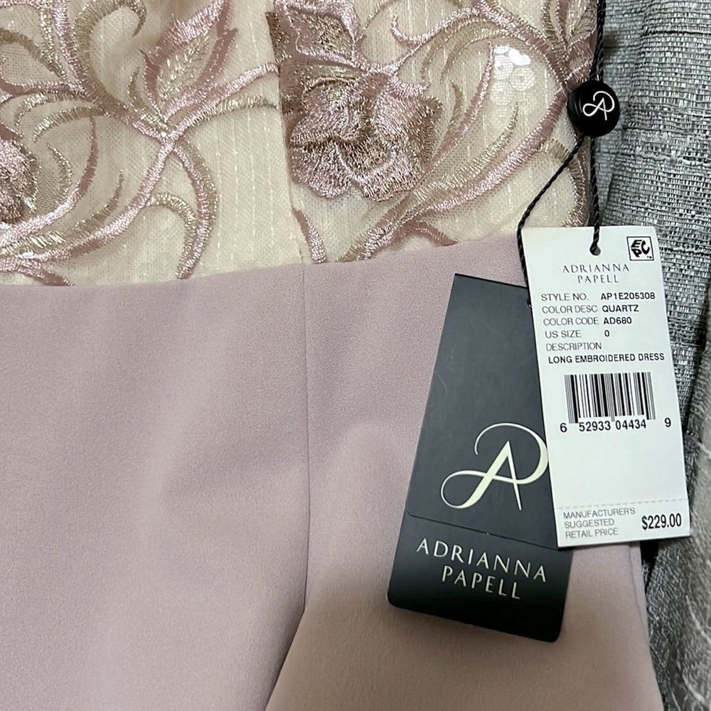 Brand new. Size 0 dress. But will fit a size 4